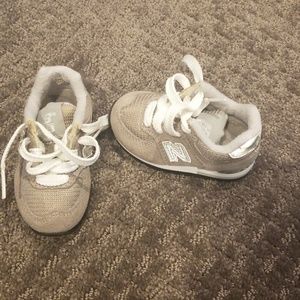 Grey New Balance tennis shoes